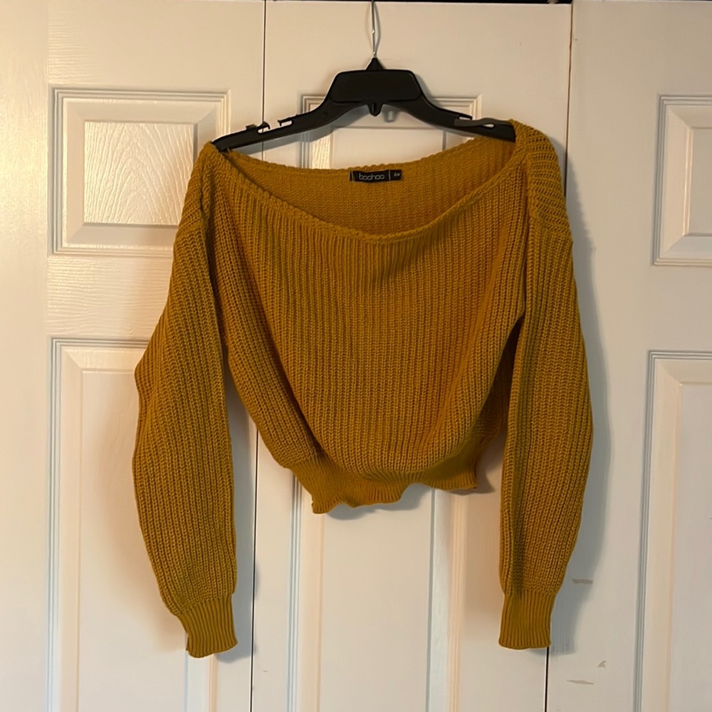 Womens cropped crochet/knit sweater.